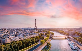 Paris aerial panorama with river Seine and Eiffel tower, France. Romantic summer holidays vacation destination. Panoramic view above historical Parisi