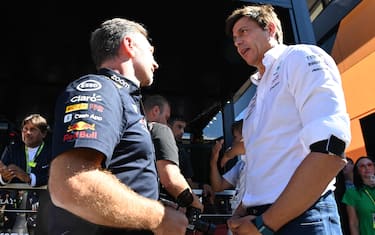 AUTODROMO NAZIONALE MONZA, ITALY - SEPTEMBER 11: Christian Horner, Team Principal, Red Bull Racing, and Toto Wolff, Team Principal and CEO, Mercedes AMG during the Italian GP at Autodromo Nazionale Monza on Sunday September 11, 2022 in Monza, Italy. (Photo by Mark Sutton / Sutton Images)