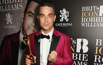 Robbie Williams receives the BRITs Icon Award at a special gig presented by Cafe Royal at the Troxy on November 7, 2016 in London, England.