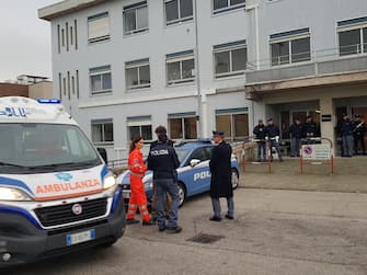 An ambulance is seen in front of the morgue of the hospital in Ancona, central Italy, where the victims have been transported, 08 December 2018. A stampede outside the nightclub 'La Lanterna Azzurra' in Corinaldo, near Ancona, has killed six people and injured more than 100, after someone probably caused a panic with a stinging spray. The incident took place at a packed club hosting a concert by popular Italian rapper Sfera Ebbasta. ANSA/ ANGELO EMMA 