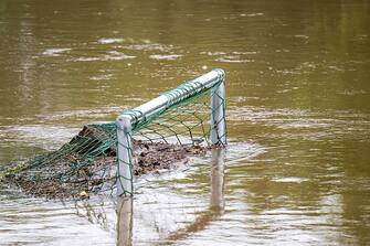 02 June 2024, Bavaria, Regensburg: Leaves and twigs collect in a flooded soccer goal in the high water of the Danube, a bird picks out usable material. In Regensburg, the Danube has burst its banks. The flood waters are expected to rise further. Photo: Pia Bayer/dpa (Photo by Pia Bayer/picture alliance via Getty Images)