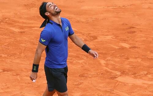 Italy's Fabio Fognini celebrates after defeating Spain's Rafael Nadal during the semi final tennis match of the Monte-Carlo ATP Masters Series tournament in Monaco on April 20, 2019. (Photo by VALERY HACHE / AFP)        (Photo credit should read VALERY HACHE/AFP via Getty Images)