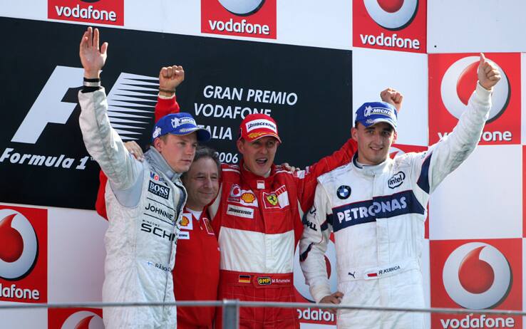 2006 Italian Grand Prix - Sunday Race, Monza, Italy.
Kimi Raikkonen, McLaren MP4/21-Mercedes-Benz, 2nd position, Jean Todt, Michael Schumacher, Ferrari 248F1, 1st position, and Robert Kubica, Sauber F1.06-BMW, 3rd position, podium.
10th September 2006 
World Copyright: Steve Etherington/LAT Photographic 
ref: 48mb Hi Res Digital Image Only