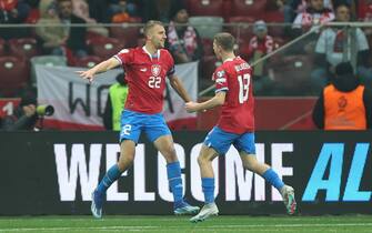 epa10981646 Tomas Soucek (L) of Czech Republic celebrates after scoring a goal to make it 1:1 during the UEFA EURO 2024 qualifying soccer match between Poland and the Czech Republic in Warsaw, Poland, 17 November 2023.  EPA/Leszek Szymanski POLAND OUT