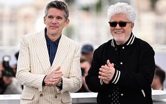 US actor Ethan Hawke (L) and Spanish film director Pedro Almodovar pose during a photocall for the film "Extrana Forma de Vida" (Strange Way of Life) at the 76th edition of the Cannes Film Festival in Cannes, southern France, on May 17, 2023. (Photo by LOIC VENANCE / AFP) (Photo by LOIC VENANCE/AFP via Getty Images)