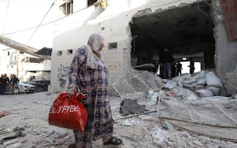 epa10932244 Palestinians inspect the damages following an Israeli airstrike at Al-Ansar Mosque at Jenin refugee camp on 22 October 2023. At least two people were killed in an early morning Israeli forces airstrike on Al Ansar mosque in Jenin, according to Palestinian Health Ministry. The Israeli Defense Forces said the airstrike was targeting the Hamas and Islamic Jihad terrorist compound in the Al-Ansar Mosque in Jenin.  EPA/ALAA BADARNEH