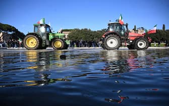 Farmers gather with tractors at Circo Massimo during a protest to ask for better working conditions on February 15, 2024 in Rome. Farmers staged demonstrations for weeks all around Italy to demand lower fuel taxes, better prices for their products and an easing of EU environmental regulations that they say makes it more difficult to compete with cheaper foreign produce. (Photo by Tiziana FABI / AFP)
