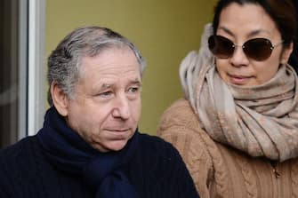 epa04005372 President of the Federation Internationale de l'Automobile (FIA) Jean Todt (L) and his wife, actress Michelle Yeoh, leave the 'Centre Hospitalier Universitaire' (CHU) hospital in Grenoble, near the French Alps, France, 01 January 2014. Sabine Kehm, manager of retired Formula One German racing driver Michael Schumacher, said Schumacher' s condition was stable and has not changed since doctors said he showed small signs of improvement. Schumacher, who turns 45 on 03 January, suffered critical head injuries when he fell and struck a rock Sunday while skiing.  EPA/DAVID EBENER