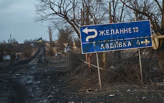 AVDIIVKA DISTRIKT, UKRAINE - FEBRUARY 14: A street sign seen on the road to the city, the outskirts of Avdiivka on February 14, 2024 in Avdiivka district, Ukraine. Both Ukraine and Russia have recently claimed gains in the Avdiivka, where Russia is continuing a long-running campaign to capture the city, located in the Ukraine's eastern Donetsk Region. Last week, the Russian army was successful in advancing towards the city and captured the main supply road. (Photo by Kostiantyn Liberov/Libkos/Getty Images)