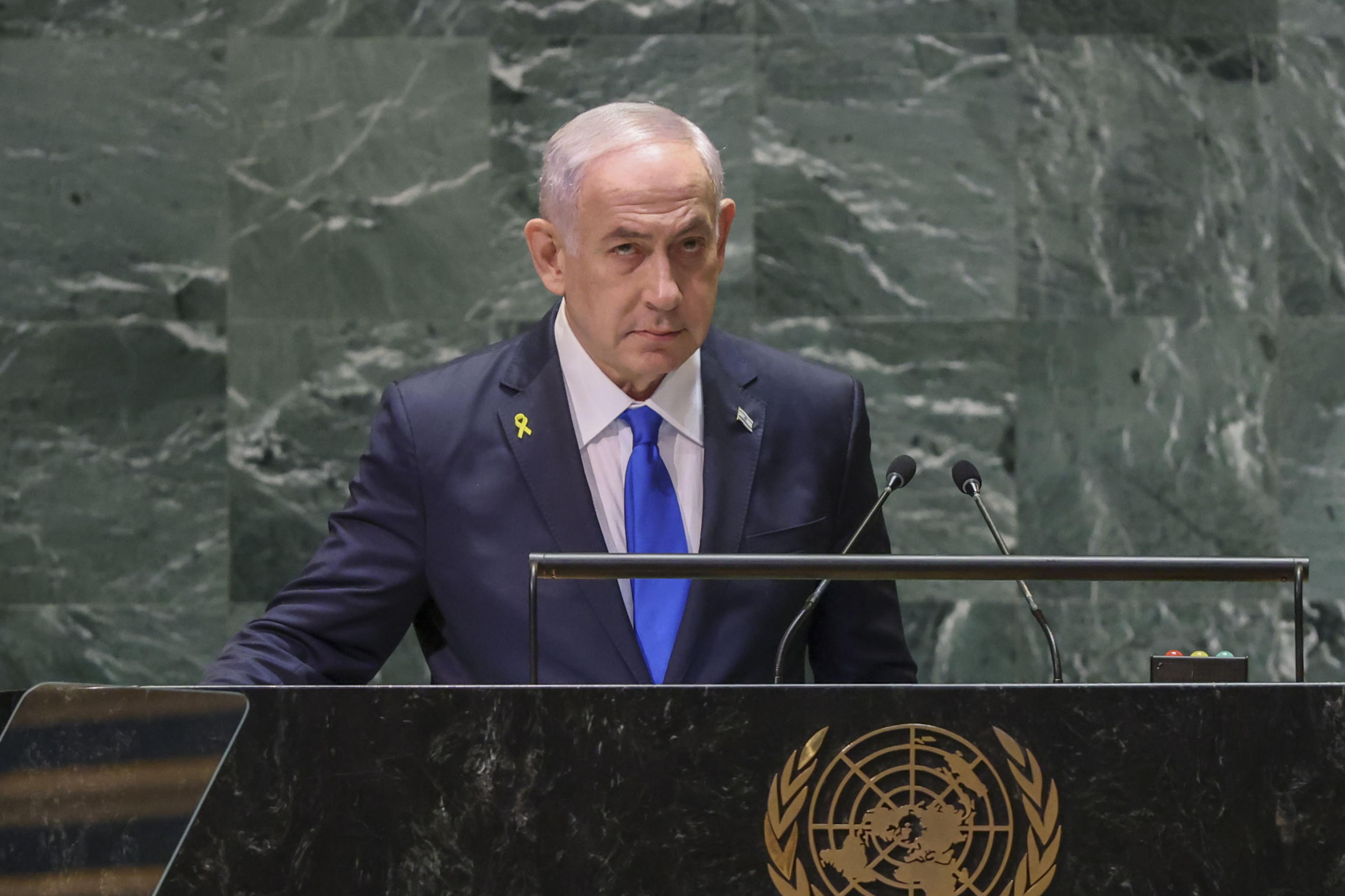epa11628622 Israel Prime Minister Benjamin Netanyahu approaches the podium for his address during the General Debate of the 79th session of the United Nations General Assembly at United Nations Headquarters in New York, New York, USA, 27 September 2024. The annual high-level General Debate gathers world leaders from 24 to 28 September, and 30 September under the theme, 'Leaving no one behind: acting together for the advancement of peace, sustainable development and human dignity for present and future generations'.  EPA/SARAH YENESEL