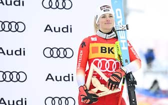 epa11017361 Third placed Lara Gut-Behrami of Switzerland on the podium after the women's Super-G race at the Alpine Skiing FIS Ski World Cup, in St. Moritz, Switzerland, 08 December 2023.  EPA/GIAN EHRENZELLER