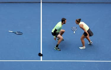 NEW YORK, NEW YORK - SEPTEMBER 05: Sara Errani (R) and Andrea Vavassori (L) of Italy celebrate after defeating Taylor Townsend and Donald Young of the United States in their Mixed Doubles Final match on Day Eleven of the 2024 US Open at USTA Billie Jean King National Tennis Center on September 05, 2024 in the Flushing neighborhood of the Queens borough of New York City. (Photo by Luke Hales/Getty Images)