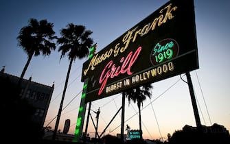 LOS ANGELES, CA - February 1, 2012: The glowing sign at Musso and Frank Grill on top of the Restaurant on Hollywood Boulevard on February 1, 2012, in Los Angeles, California. (Photo by Bret Hartman For The Washington Post via Getty Images)