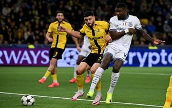Inter Milan's French forward #09 Marcus Thuram (R) scores a goal in front of Young Boys' Swiss defender #23 Loris Benito during the UEFA Champions League, league phase day 3, football match between Young Boys and Inter Milan at the Wankdorf Stadium in Bern on October 23, 2024. (Photo by Fabrice COFFRINI / AFP)