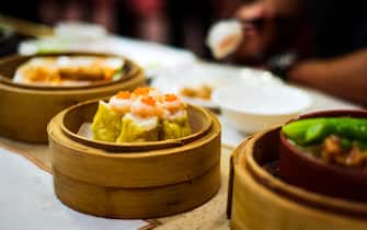 Chinese Cantonese dimsum meal served in traditional bamboo steamer