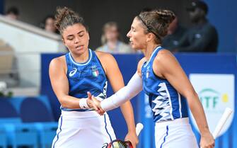 epa11525874 Sara Errani and Jasmine Paolini of Italy react during the Women Doubles gold medal match against Mirra Andreeva and Diana Shnaider of Russia, of the Tennis competitions in the Paris 2024 Olympic Games, at the Roland Garros in Paris, France, 04 August 2024.  EPA/CAROLINE BLUMBERG