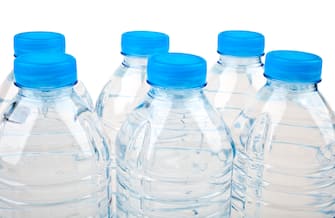 Bottled Water over a white background.