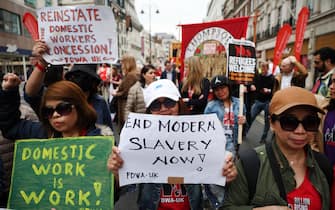 epa11312640 Workers from various nationalities and unions hold a May Day march and rally in London, Britain, 01 May 2024. Labor Day, or May Day, is observed all over the world on the first day of May to celebrate the economic and social achievements of workers and advocate for their rights.  EPA/ANDY RAIN