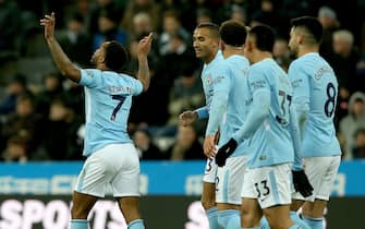epa06407289 Manchester City's Raheem Sterling (L) reacts after scoring during the English premier league soccer match between Newcastle United and Manchester City at St James Park Stadium in Newcastle, Britain, 27 December 2017.  EPA/Nigel Roddis EDITORIAL USE ONLY. No use with unauthorized audio, video, data, fixture lists, club/league logos or 'live' services. Online in-match use limited to 75 images, no video emulation. No use in betting, games or single club/league/player publications