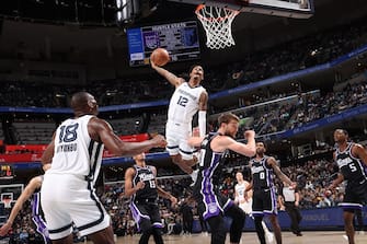 MEMPHIS, TN - DECEMBER 31:  Ja Morant #12 of the Memphis Grizzlies goes to the basket during the game on December 31, 2023 at FedExForum in Memphis, Tennessee. NOTE TO USER: User expressly acknowledges and agrees that, by downloading and or using this photograph, User is consenting to the terms and conditions of the Getty Images License Agreement. Mandatory Copyright Notice: Copyright 2023 NBAE (Photo by Joe Murphy/NBAE via Getty Images)
