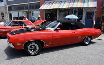 A 1970 Ford Torino GT 429 Cobra Jet on display at a car show.