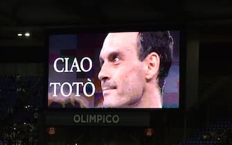 ROME, ITALY - OCTOBER 10: A general view inside the stadium as an image of Salvatore Schillaci, former Italian football player, is displayed with the message 'Ciao Totò, following his recent passing during the UEFA Nations League 2024/25 League A Group A2 match between Italy and Belgium at Stadio Olimpico on October 10, 2024 in Rome, Italy. (Photo by Giuseppe Bellini - FIGC/Getty Images)