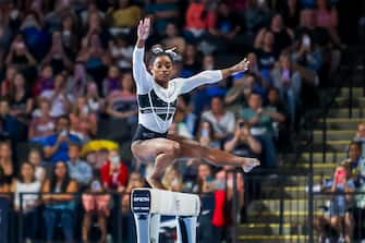 epa10786886 US artistic gymnast Simone Biles competes on the balance beam during the Core Hydration Classic at the NOW Arena in Hoffman Estates, Illinois, USA, 05 August 2023. Biles is returning to competition after a two-year break after the Tokyo 2020 Olympics.  EPA/ALEX WROBLEWSKI