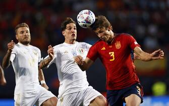 epa10693723 (l-r) Ciro Immobile of Italy, Nicolo Zaniolo of Italy, Robin Le Normand of Spain during the UEFA Nations League semi-final match between Spain and Italy at Stadion De Grolsch Veste in Enschede, Netherlands, 15 June 2023.  EPA/MAURICE VAN STEEN