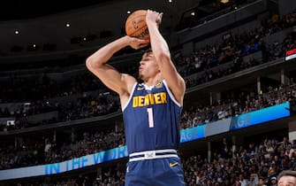 DENVER, CO - JUNE 4: Michael Porter Jr. #1 of the Denver Nuggets shoots a three point basket during Game Two of the 2023 NBA Finals on June 4, 2023 at the Ball Arena in Denver, Colorado. NOTE TO USER: User expressly acknowledges and agrees that, by downloading and/or using this Photograph, user is consenting to the terms and conditions of the Getty Images License Agreement. Mandatory Copyright Notice: Copyright 2023 NBAE (Photo by Jesse D. Garrabrant/NBAE via Getty Images)