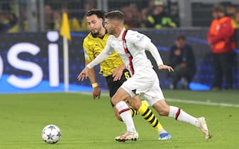 Christian Pulisic of AC Milan and Ramy Bensebaini of Borussia Dortmund during the UEFA Champions League, Group F football match between Borussia Dortmund and AC Milan on October 4, 2023 at Signal Iduna Park in Dortmund, Germany