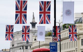 LONDON, UNITED KINGDOM - APR 26, 2023 - Coronation of King Charles III, flags on the Strand.