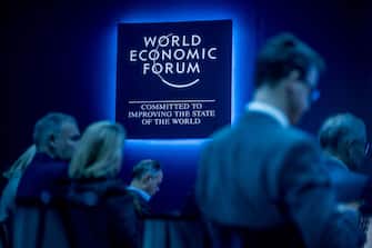 TOPSHOT - Participants wait for a session at the World Economic Forum (WEF) annual meeting in Davos, on January 16, 2024. (Photo by Fabrice COFFRINI / AFP) (Photo by FABRICE COFFRINI/AFP via Getty Images)