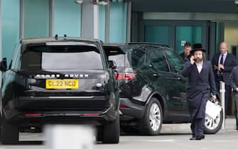 Two black SUVs wait outside the Windsor Suite at Heathrow Airport, London, ahead of the arrival of the Duke of Sussex who is travelling to the UK from Los Angeles following the announcement of King Charles III's cancer diagnosis on Monday evening. The King has been diagnosed with a form of cancer and has begun a schedule of regular treatments, and while he has postponed public duties he "remains wholly positive about his treatment", Buckingham Palace said. Picture date: Tuesday February 6, 2024. (Photo by Jordan Pettitt/PA Images via Getty Images)