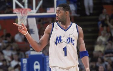 26 Nov 2001:  Forward Tracy McGrady #1 of the Orlando Magic walks down the court and points during the NBA game against the Detroit Pistons at the TD Waterhouse Centre in Orlando, Florida.  The Pistons defeated the Magic 105-100.  NOTE TO USER: User expressly acknowledges and agrees that, by downloading and/or using this Photograph, User is consenting to the terms and conditions of the Getty Images License Agreement. Mandatory copyright notice: Copyright 2001 NBAE Mandatory Credit: Fernando Medina /NBAE/Getty Images
