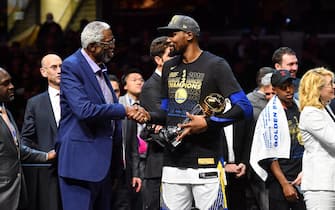 CLEVELAND, OH - JUNE 8: Bill Russell exchanges handshakes with Kevin Durant #35 of the Golden State Warriors after Durant received the Bill Russell Finals MBP Trophy by defeating the Cleveland Cavaliers in Game Four of the 2018 NBA Finals on June 8, 2018 at Quicken Loans Arena in Cleveland, Ohio. NOTE TO USER: User expressly acknowledges and agrees that, by downloading and/or using this Photograph, user is consenting to the terms and conditions of the Getty Images License Agreement. Mandatory Copyright Notice: Copyright 2018 NBAE (Photo by Jesse D. Garrabrant/NBAE via Getty Images)