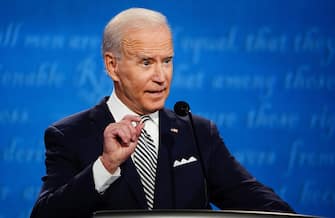 epa08707106 Democratic presidential candidate Joe Biden participates in the first 2020 presidential election debate at Samson Pavilion in Cleveland, Ohio, USA, 29 September 2020. The first presidential debate is co-hosted by Case Western Reserve University and the Cleveland Clinic.  EPA/JIM LO SCALZO