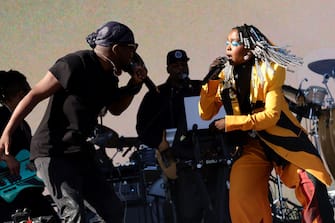 INDIO, CALIFORNIA - APRIL 14: (FOR EDITORIAL USE ONLY) (L-R) Wyclef Jean and Lauryn Hill perform at Coachella Stage during the 2024 Coachella Valley Music and Arts Festival at Empire Polo Club on April 14, 2024 in Indio, California. (Photo by Arturo Holmes/Getty Images for Coachella)