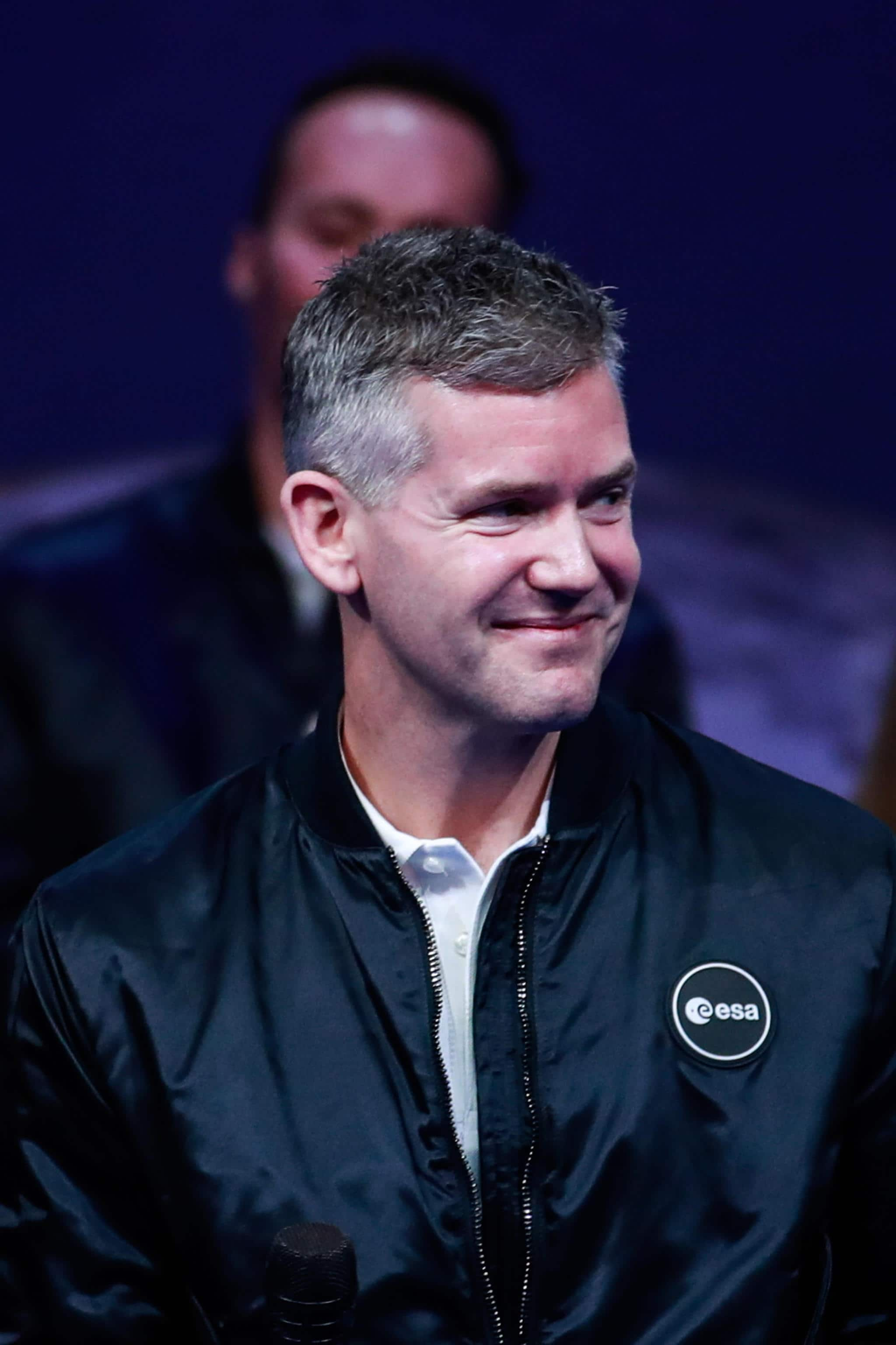 epa10323618 European Space Agency (ESA) new class astronaut John McFall of Britain (C)  during a ceremony of unveiling the European Space Agency new class of career astronauts at Grand Palais Ephemere in Paris, France, 23 November 2022.  EPA/Mohammed Badra