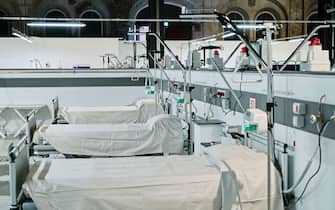 Covid field hospital, set up in a former industrial plant, with 90 beds equipped for coronavirus intensive therapy. Turin, Italy - April 2020