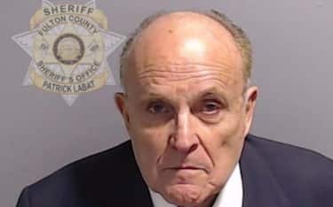 ATLANTA, GEORGIA - AUGUST 23: In this handout provided by the Fulton County Sheriff's Office, Rudy Giuliani, former personal lawyer for former President Donald Trump poses for his booking photo on August 23, 2023 in Atlanta, Georgia. Former President Donald Trump and 18 others facing felony charges in the indictment related to tampering with the 2020 election in Georgia have been ordered to turn themselves in by August 25. (Photo by Fulton County Sheriff's Office via Getty Images)