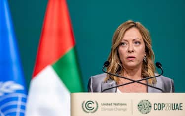epa11006831 Giorgia Meloni, Prime Minister of Italy, speaks during the UN Climate Change Conference COP28, in Dubai, United Arab Emirates, 02 December 2023. The 2023 United Nations Climate Change Conference (COP28), runs from 30 November to 12 December, and is expected to host one of the largest number of participants in the annual global climate conference as over 70,000 estimated attendees, including the member states of the UN Framework Convention on Climate Change (UNFCCC), business leaders, young people, climate scientists, Indigenous Peoples and other relevant stakeholders will attend.  EPA/MARTIN DIVISEK