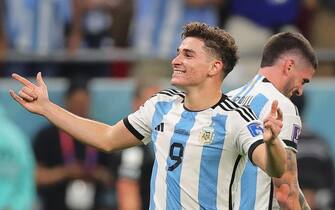 epa10346862 Julian Alvarez of Argentina celebrates after scoring the 2-0 lead during the FIFA World Cup 2022 round of 16 soccer match between Argentina and Australia at Ahmad bin Ali Stadium in Doha, Qatar, 03 December 2022.  EPA/Friedemann Vogel