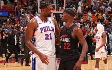 MIAMI, FL - APRIL 4: Joel Embiid #21 of the Philadelphia 76ers and Jimmy Butler #22 of the Miami Heat embrace after the game on April 4, 2024 at Kaseya Center in Miami, Florida. NOTE TO USER: User expressly acknowledges and agrees that, by downloading and or using this Photograph, user is consenting to the terms and conditions of the Getty Images License Agreement. Mandatory Copyright Notice: Copyright 2024 NBAE (Photo by Issac Baldizon/NBAE via Getty Images)