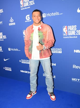 PARIS, FRANCE - JANUARY 11: French professional footballer Kylian Mbappe arrives at the red carpet prior to the game between the Brooklyn Nets and Cleveland Cavaliers as part of NBA Paris Games 2024 on January 11, 2024 at Accor Arena in Paris, France. NOTE TO USER: User expressly acknowledges and agrees that, by downloading and/or using this photograph, User is consenting to the terms and conditions of the Getty Images License Agreement. Mandatory Copyright Notice: Copyright 2024 NBAE (Photo by Mansoor Ahmed/NBAE via Getty Images)