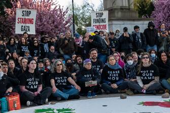 NEW YORK, NEW YORK - APRIL 23: Jews and supporters hold a Passover Seder to protest the war in Gaza on April 23, 2024 in the Brooklyn borough of New York City. The event, which resulted in dozens of arrests, was held blocks from the residence of U.S. Sen. Chuck Schumer (D-NY). Schumer is a longtime supporter of Israel, but has recently criticized President Benjamin Netanyahu for Isreal's conduct of the war. (Photo by Spencer Platt/Getty Images)