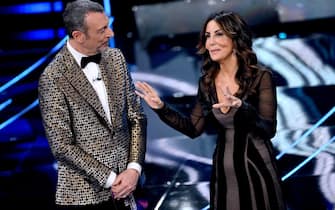 Sanremo Festival host and artistic director Amadeus with Italian actress Sabrina Ferilli on stage at the Ariston theatre during the 74th Sanremo Italian Song Festival, in Sanremo, Italy, 08 February 2024. The music festival will run from 06 to 10 February 2024.  ANSA/ETTORE FERRARI