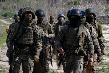 epa11270151 Members of the 'Siberian Battalion' attend their military training on a shooting range near Kyiv, Ukraine, 10 April 2024. The 'Siberian Battalion' military unit was formed as part of the International Legion of the Ukrainian Armed Forces and contains Russian nationals, former military personnel, civil activists and volunteers who choose to fight against Russian troops in Ukraine. Ukraine-aligned Russian fighters from 'Russian Volunteer Corps', 'Siberian Battalion' and 'Freedom of Russia Legion', have been carrying out cross-border raids inside Russia s Belgorod and Kursk regions in March 2024.  EPA/SERGEY DOLZHENKO