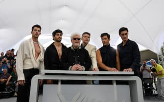 Spanish film director Pedro Almodovar (3rdL) poses with (from L) Spanish actor Manu Rios, Portuguese actor Jose Condessa, US actor Ethan Hawke, Spanish actor Jason Fernandez and actor George Steane during a photocall for the film "Extrana Forma de Vida" (Strange Way of Life) at the 76th edition of the Cannes Film Festival in Cannes, southern France, on May 17, 2023. (Photo by Patricia DE MELO MOREIRA / AFP) (Photo by PATRICIA DE MELO MOREIRA/AFP via Getty Images)
