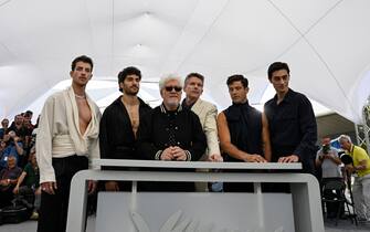Spanish film director Pedro Almodovar (3rdL) poses with (from L) Spanish actor Manu Rios, Portuguese actor Jose Condessa, US actor Ethan Hawke, Spanish actor Jason Fernandez and actor George Steane during a photocall for the film "Extrana Forma de Vida" (Strange Way of Life) at the 76th edition of the Cannes Film Festival in Cannes, southern France, on May 17, 2023. (Photo by Patricia DE MELO MOREIRA / AFP) (Photo by PATRICIA DE MELO MOREIRA/AFP via Getty Images)