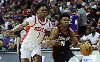 LAS VEGAS, NEVADA - JULY 07: Scoot Henderson #00 of the Portland Trail Blazers dribbles the ball against Amen Thompson #1 of the Houston Rockets during the third quarter at the Thomas & Mack Center on July 07, 2023 in Las Vegas, Nevada. (Photo by Ethan Miller/Getty Images)